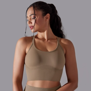 Detailed texture of seamless brown ribbed sports bra and matching high waist leggings