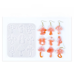 Silicone mushroom earring mold with nine unique styles and finished resin pendant samples