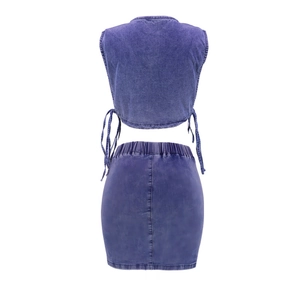 Detail view of purple acid wash denim set with lace-up tank top and bodycon skirt