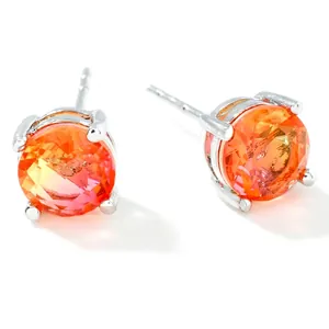 Detail view of 0.6cm mini round stud earrings featuring faceted orange pink crystal stones