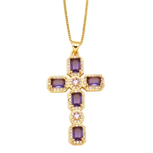 Detail of cross pendant necklace with purple gemstones and micro-pave crystals on gold chain