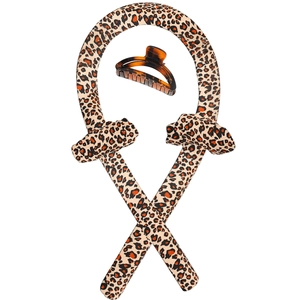 Close-up of leopard print heatless hair curler set with a brown claw clip for styling