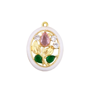 Detail of oval gold-plated pendant with white enamel and colorful crystal floral inlay