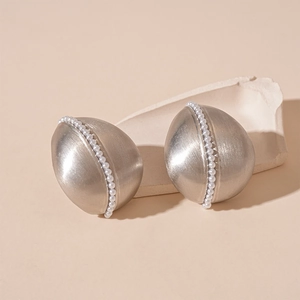 Minimalist silver oval drop earrings with matte brushed metal finish and faux pearl inlay