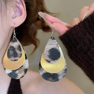 Vintage leopard print teardrop layered hook earrings with golden metallic accents