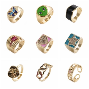 Set of 9 gold adjustable rings with butterfly, heart, and star designs for women