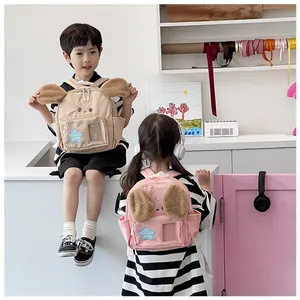 Detail of cute puppy ears and star patch on canvas children backpacks for kindergarten