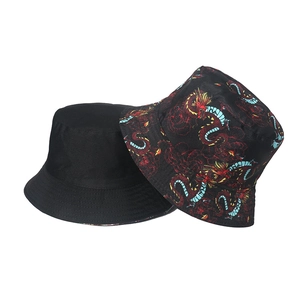 Double-sided reversible bucket hat featuring classic black and Chinese dragon pattern