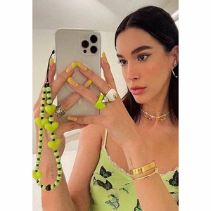 Fashionable neon green heart and striped bead phone charm strap for Y2K style accessory