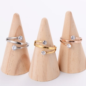 Minimalist triple-line open ring with round zircons and Roman numeral engravings