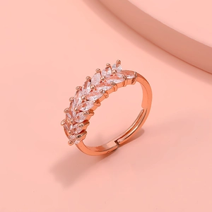 Macro detail of rose gold adjustable ring with marquise zircon wheat ear patterns