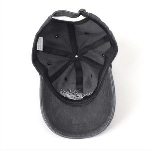 Detail view of the washed grey baseball cap showing inner structure and stitching