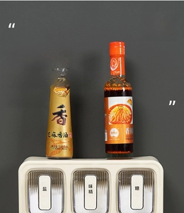 Wall-mounted seasoning box with three drawers and top shelf for kitchen storage