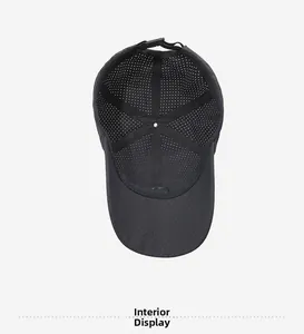 Internal view of black mesh baseball cap showing breathable lining and adjustable strap