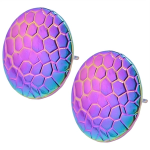 Macro detail of rainbow iridescent 304 stainless steel stud earrings with textured finish