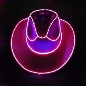 Pink LED neon light silhouette of a cowboy hat for festive wall decoration