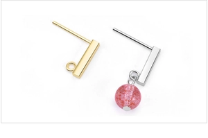 Detailed view of S925 sterling silver bar stud earrings with strawberry crystal pendant