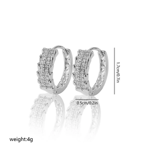 Detail shot of silver hoop earrings with clear zircon stones showing dimensions and weight