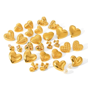 Collection of textured 18K gold plated stainless steel heart earrings in various styles