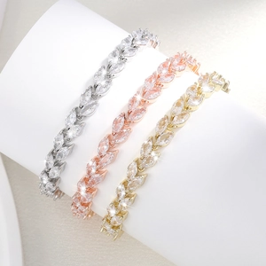 Sparkling leaf-shaped rhinestone bracelets in silver, rose gold, and gold finishes