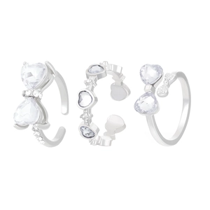 Dreiteiliges silbernes verstellbares Ringset mit rosa Herzsteinen und Glitzerschleifen