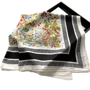 French floral silk scarf with colorful botanical prints in a elegant black gift box