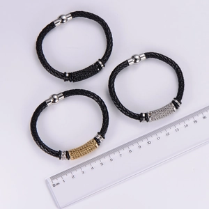 Mens woven leather bracelets in black, gold, and silver finishes with magnetic clasp