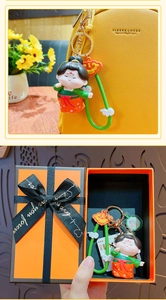 Cartoon girl keychain charm with cloud pendant and ribbon in a premium gift box