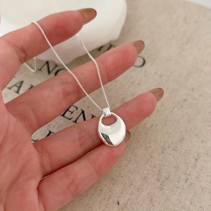 Handheld minimalist silver 925 irregular streamlined pendant necklace with polished finish