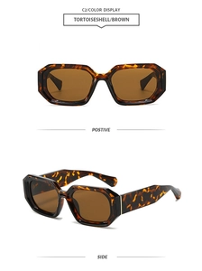 Macro detail of tortoiseshell brown square sunglasses with thick frames and tea lenses