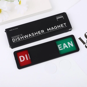 Close-up of black dishwasher clean dirty magnet sign with slider and adhesive pads