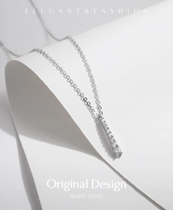 Detail of S925 sterling silver Y-shaped tassel necklace with sparkling moissanite stones