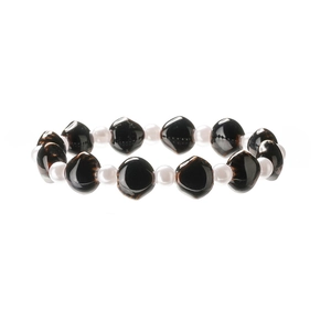 Artistic ceramic beaded bracelet with dark marbled texture and small white accent pearls