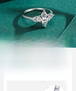Macro detail of S925 sterling silver ring with marquise and pear cut cubic zirconia