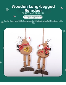 Detail of handcrafted wooden Christmas elk ornaments with red scarves and star cutouts