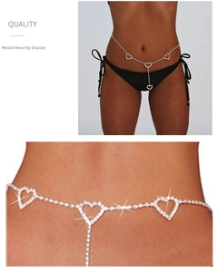 Detail of silver rhinestone waist chain with heart pendants and dangling crystal tassels