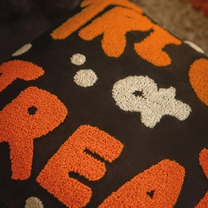 Halloween black pillow cover with orange and white 3D textured embroidery and plush fabric