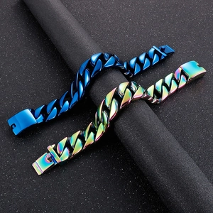 Detail of 20mm blue and rainbow Cuban link bracelets in polished stainless steel