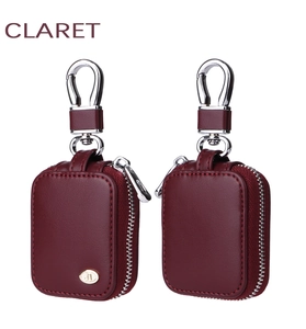 Close-up of Claret leather case for AirPods with silver metal zipper and swivel hook