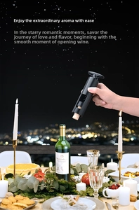 Modern black manual wine opener set in a romantic dinner scene with a city night view