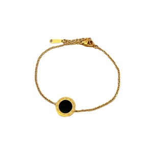 Gold plated stainless steel bracelet with a black shell roman numeral pendant