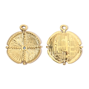 Detailed shot of gold-plated stainless steel pendants with embossed moon and blue gemstone