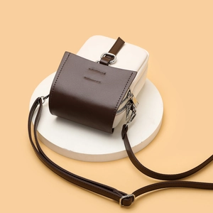 Vertical bi-color brown and cream leather mini crossbody bag and mobile phone pouch