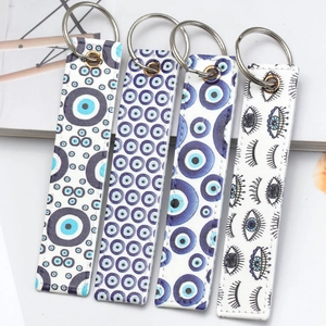 Evil Eye pattern faux leather keychain set with blue and white PU leather charms