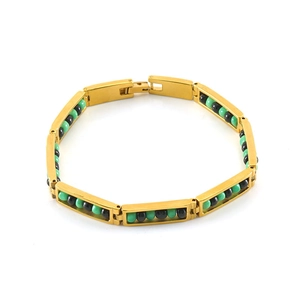 Detail of gold titanium steel bracelet with green and black beads in rectangular links