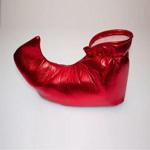 Detailed side view of shiny red metallic elf shoes with curved toes for festive cosplay