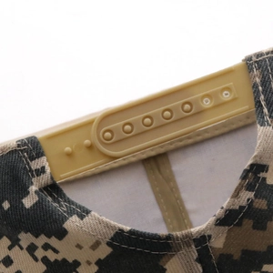 Detail of adjustable snapback closure on a digital camouflage cotton baseball cap