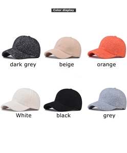 Color display of knitted baseball caps in six colors including dark grey, beige, and orange