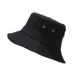 Close-up of black cotton bucket hat featuring metal eyelets and detailed stitching