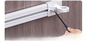 Detail showing the adjustment of the white sliding rail end cap with a screwdriver